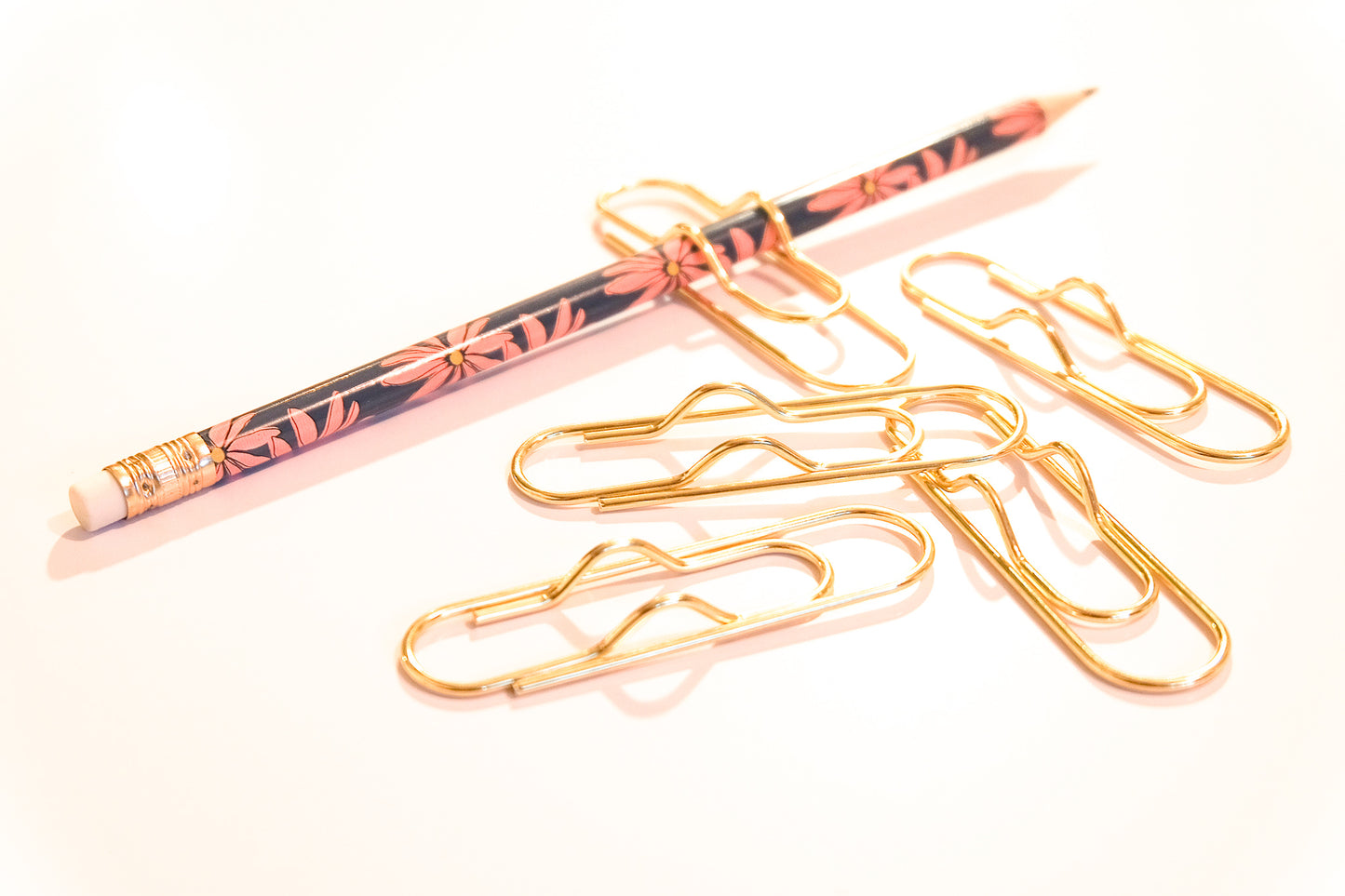 Trombones porte-crayon doré
